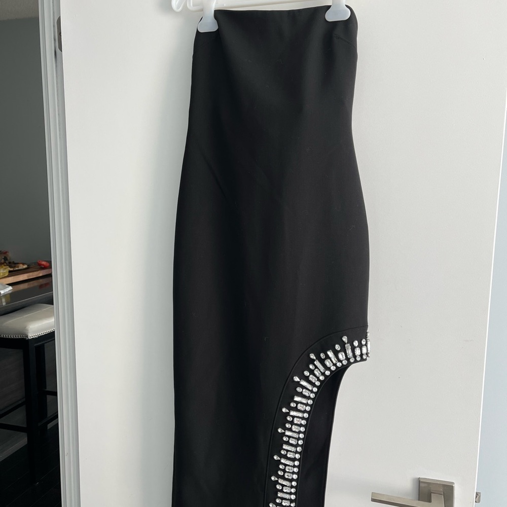 Beautiful Cinq a Sept black strapless dress with crystal detail.